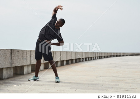 Man exercising in the morning outdoors Man exercising in the morning outdoors 81911532