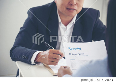 Businessman job interview by human resource HR officer interviwing, talk new employee shaking hands in office with smiling face. HR Manager interview check resume, face to face. Job Interview Concept 81912073
