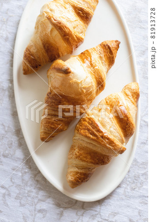 Three croissants on plate. Three croissants on plate. 81913728