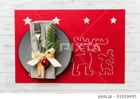 Christmas dinner background with rustic decorations and kitchen utensil . View from above Christmas dinner background with rustic decorations and kitchen utensil . View from above 81919493