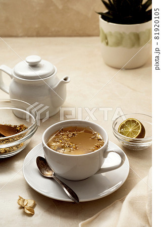 Cup of tea. Warm delicious cup of refreshing herbal tea. 81920105