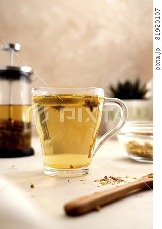 Herbal tea glass cups and teapot. Healthy relaxing herbal fresh tea 81920107