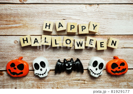 Happy Halloween alphabet letters top view on wooden background Happy Halloween alphabet letters top view on wooden background 81929177