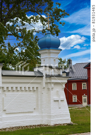 Fragment of the bell tower of a Christian church with a blue roof 81931465