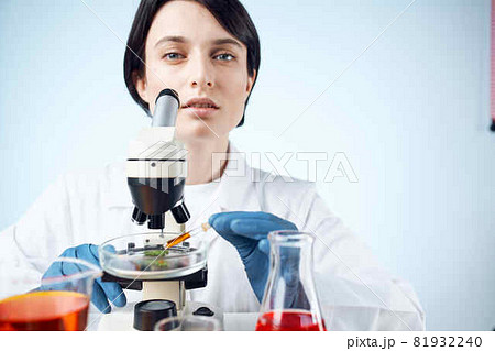 woman laboratory assistant microscope research diagnostics science work woman laboratory assistant microscope research diagnostics science work 81932240