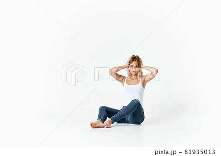 woman sitting on the floor posing fashion stylish hairstyle lifestyle woman sitting on the floor posing fashion stylish hairstyle lifestyle 81935013