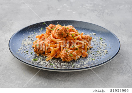 Spaghetti pasta with meatballs and cheese Spaghetti pasta with meatballs and cheese 81935996