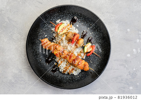 Top view of shashlik with chicken and grilled champignon with bell pepper and zucchini 81936012