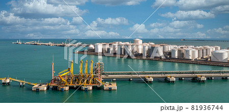 Aerial view industrial crude oil and fuel tanker ship at deep ocean sea port, Tanker ship vessel at terminal port, Business import export oil and gas petrochemical by tanker ship transportation oil. Aerial view industrial crude oil and fuel tanker ship at deep ocean sea port, Tanker ship vessel at terminal port, Business import export oil and gas petrochemical by tanker ship transportation oil. 81936744