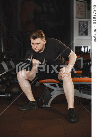 A handsome man is engaged in a gym 81937848