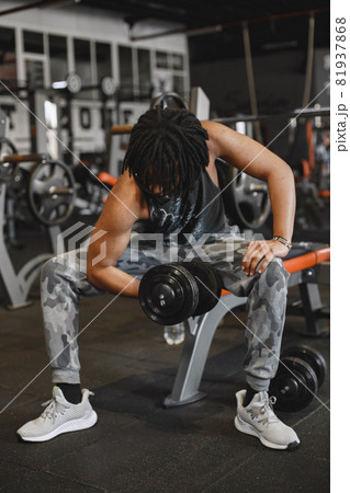 A handsome black man is engaged in a gym A handsome black man is engaged in a gym 81937868