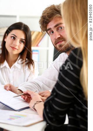 Group of people sit in office deliberate on problem Group of people sit in office deliberate on problem 81940360