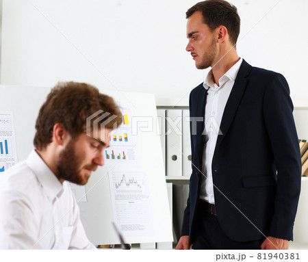 Group of people deliberate on white board problem Group of people deliberate on white board problem 81940381