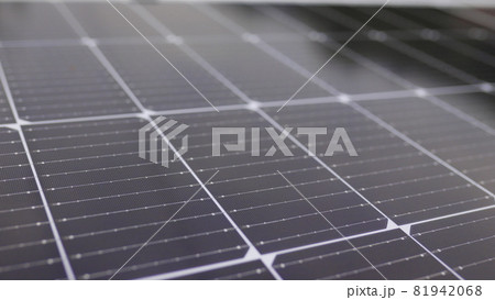 Photovoltaic solar panel extreme close up. Close-up of modern photovoltaic solar battery panels. Rows of sustainable energy solar panels installed on terrace. Solar panels on roof top. Panels at home. Photovoltaic solar panel extreme close up. Close-up of modern photovoltaic solar battery panels. Rows of sustainable energy solar panels installed on terrace. Solar panels on roof top. Panels at home. 81942068