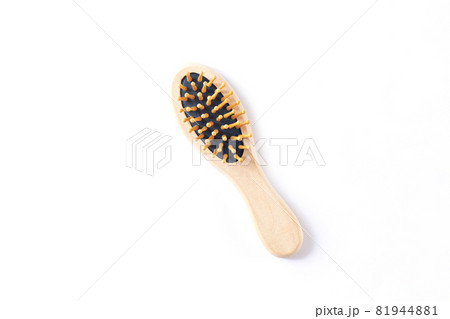 Wood massage hair brush isolated on white background 81944881