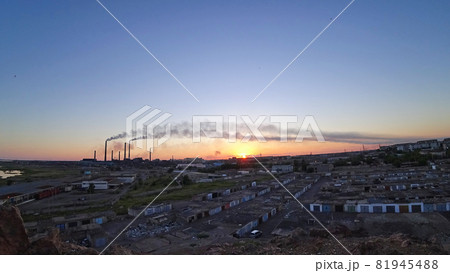An epic sunset with a view of the smoke of factory An epic sunset with a view of the smoke of factory 81945488