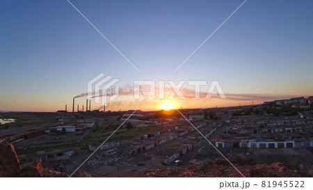 An epic sunset with a view of the smoke of factory An epic sunset with a view of the smoke of factory 81945522