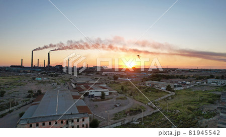 An epic sunset with a view of the smoking factory An epic sunset with a view of the smoking factory 81945542