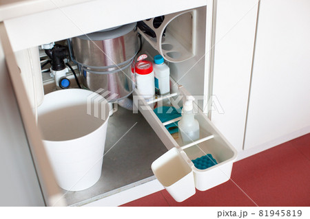 Modern kitchen organization. Drawer under the sink. 81945819