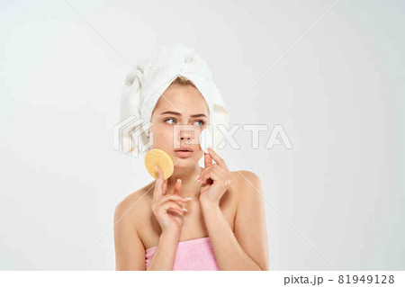 woman with towel cleans skin with sponge health problems hygiene woman with towel cleans skin with sponge health problems hygiene 81949128