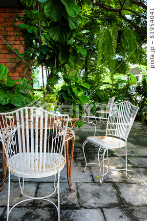 Detail of old vintage furniture in garden Detail of old vintage furniture in garden 81954041