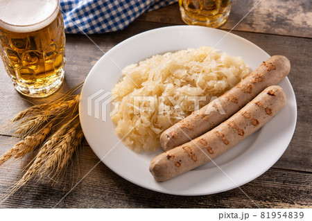 Bratwurst sausage ,sauerkraut, pretzels and beer 81954839