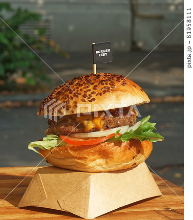 Freshly prepared burger on display attracts... - Stock Photo [81958111] -  PIXTA