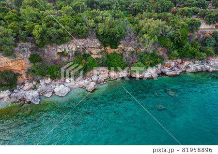 Rocky coast beach in Mparmpati, Corfu, Greece. 81958896
