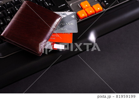 Conceptual view of on-line shopping with credit card,wallet and laptop 81959199