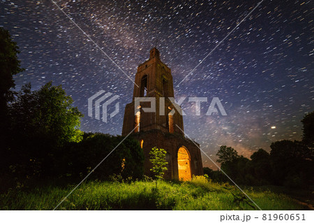 night bell tower ruin in forest at starry night with internal light night bell tower ruin in forest at starry night with internal light 81960651