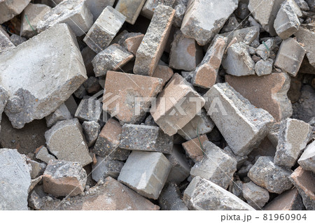 Pile of disassembled gray pavement bricks with selective focus Pile of disassembled gray pavement bricks with selective focus 81960904