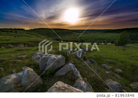 night stones moon halo landscape night stones moon halo landscape 81963846