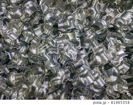 Shiny formed aluminium parts background Shiny formed aluminium parts background 81965358