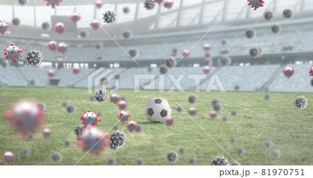 Covid-19 cells against soccer ball on sports stadium Covid-19 cells against soccer ball on sports stadium 81970751