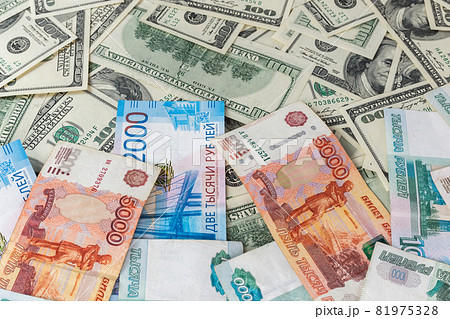 russian rubl and us dollar banknotes close-up with selective focus russian rubl and us dollar banknotes close-up with selective focus 81975328
