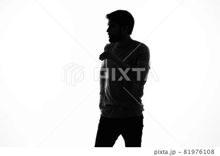 silhouette of a man and gestures with his hands posing emotions ...