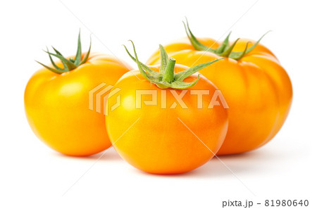 Three Yellow Tomatoes Isolated On White Background Three Yellow Tomatoes Isolated On White Background 81980640