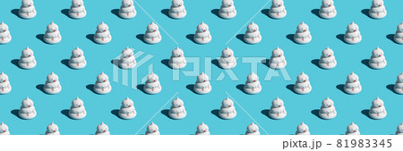 Banner with pattern of funny snowmen on blue background, as a backdrop or texture. Minimal winter concept. Wallpaper for your design Banner with pattern of funny snowmen on blue background, as a backdrop or texture. Minimal winter concept. Wallpaper for your design 81983345