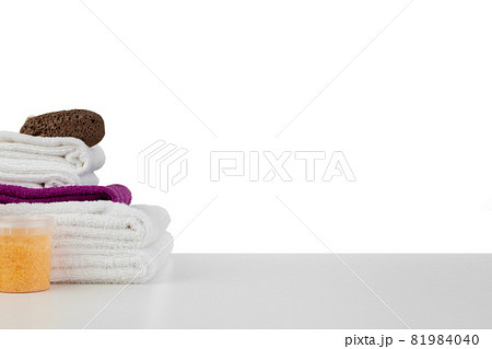 Spa still life with stacked of stone and towel isolated on white 81984040