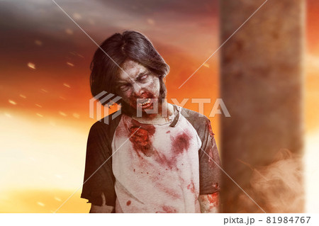 Scary zombie with blood and wound on his body Scary zombie with blood and wound on his body 81984767