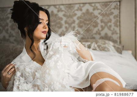 Portrait of a beautiful fashion bride, sweet and sensual. Wedding make up and hair Portrait of a beautiful fashion bride, sweet and sensual. Wedding make up and hair 81988677
