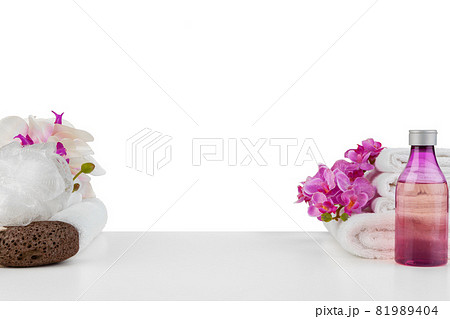 Spa composition with towels and flowers isolated on white 81989404