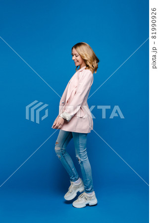 Attractive young female with new haircut poses for 81990926