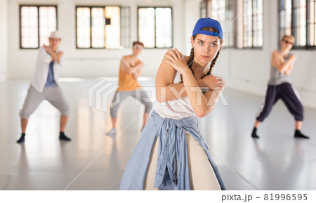 Group of young artists performing street dance 81996595