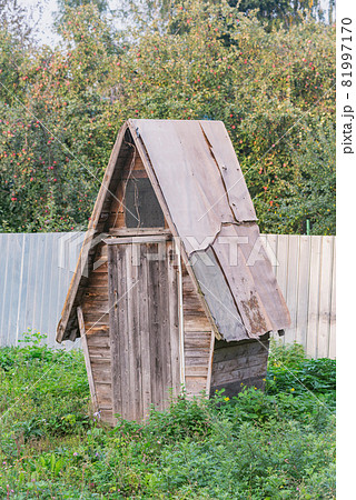 Wooden ancient toilet cabin by rthe private village house. Wooden ancient toilet cabin by rthe private village house. 81997170