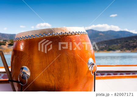 Wooden drum on a dragon boat, closeup 82007171