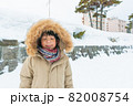 Cute asian boy in snow 82008754