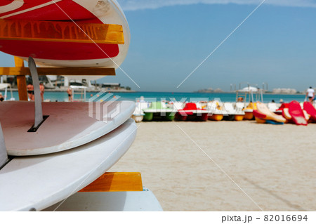 Surfboards stacked on the rack on a beach 82016694