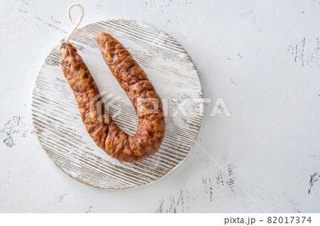 Spanish chorizo on the white background Spanish chorizo on the white background 82017374