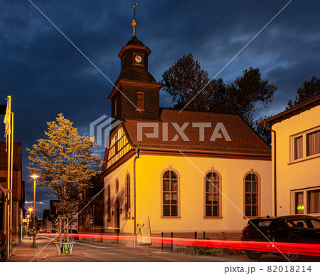 View of the historic protestant church of Walldorf in hesse during sunset 82018214